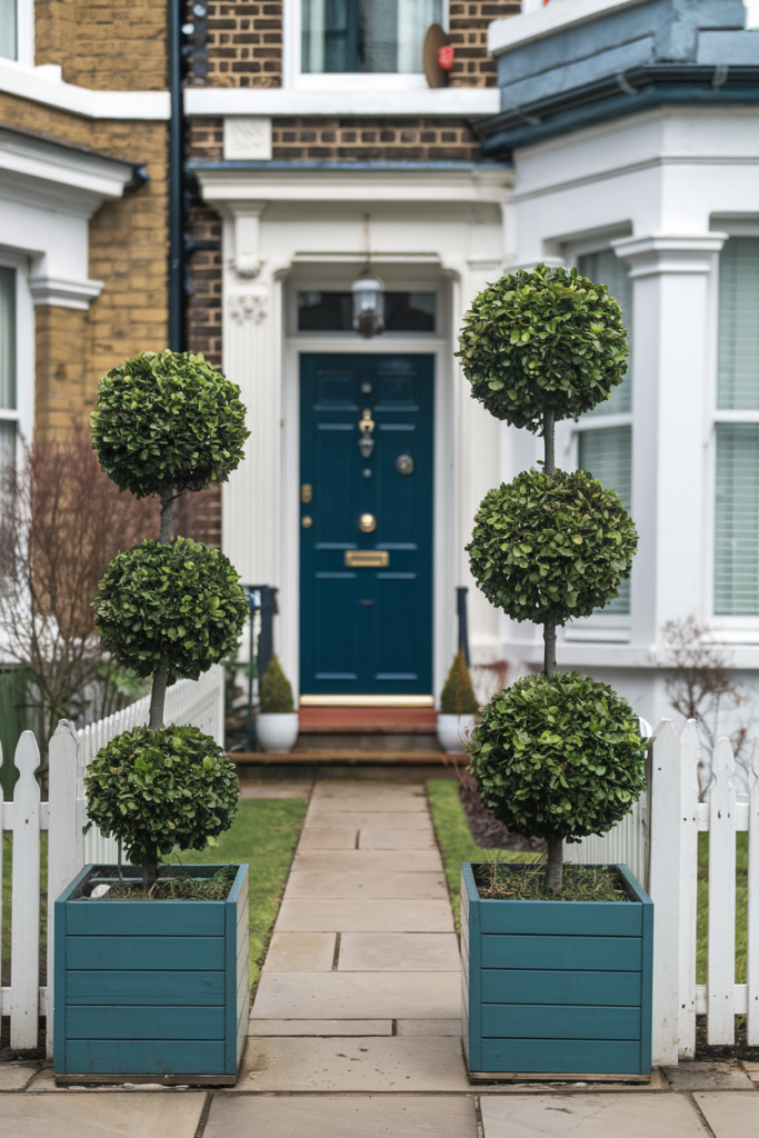 16. A Townhouse Front Garden with Topiary Trees