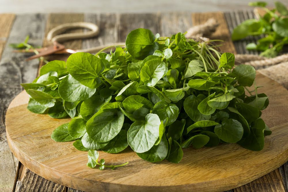 Watercress on chopping board