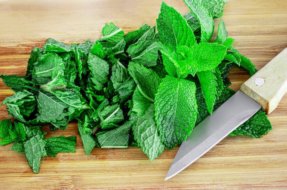 Lemon balm on chopping board