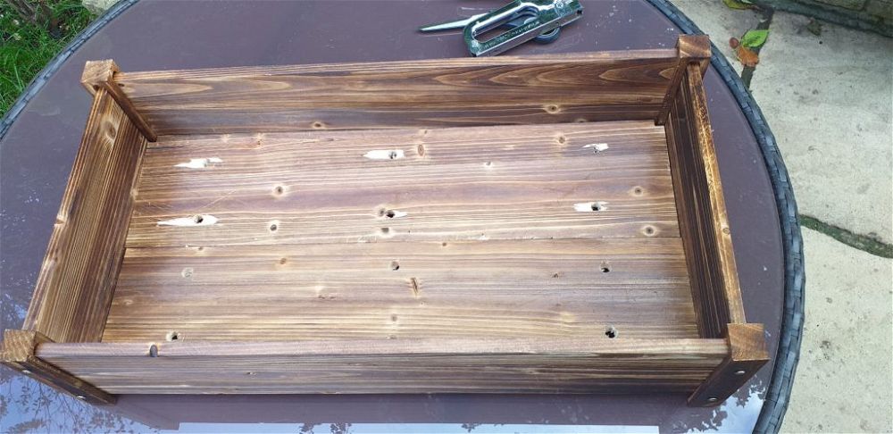 box with drill holes