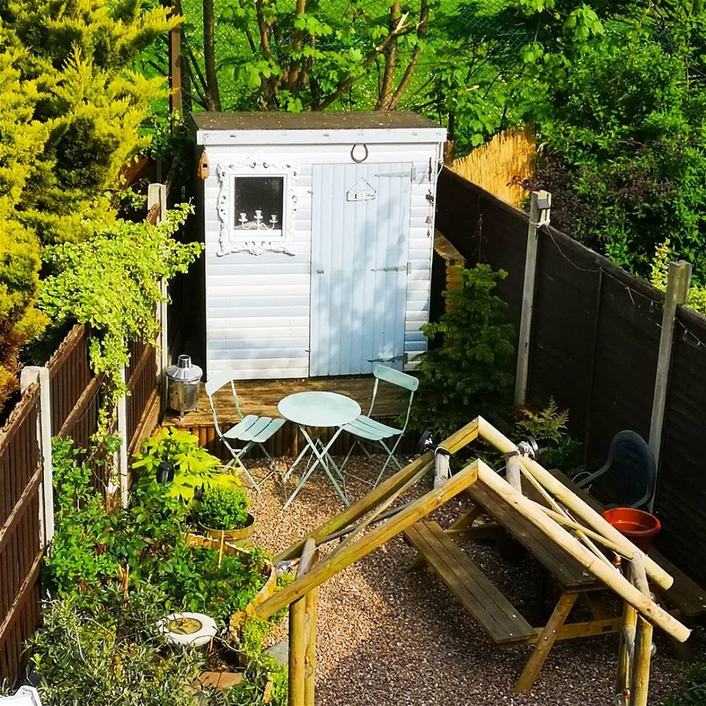 small triangle shaped garden ideas Small Triangle Garden With Shed Focal Point